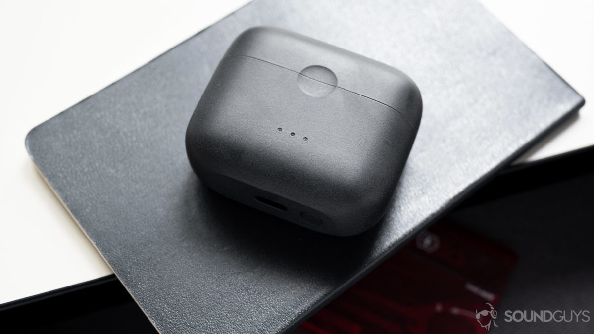 A picture of the Anker SoundCore Liberty Air 2 true wireless earbuds charging case on top of a journal