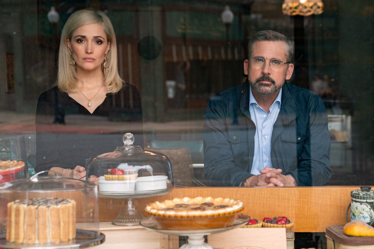 Rose Byrne and Steve Carell look out over an array of bakery pies and cakes in Irresistible, which is actually about politics, not people who can’t stop eating pastry.