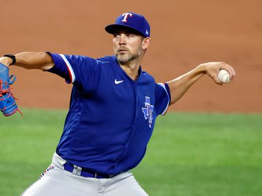 Texas Rangers starting pitcher Mike Minor throws from the mound during a simulated Summer Camp game inside Globe Life Field in Arlington, Texas, Thursday, July 9, 2020.