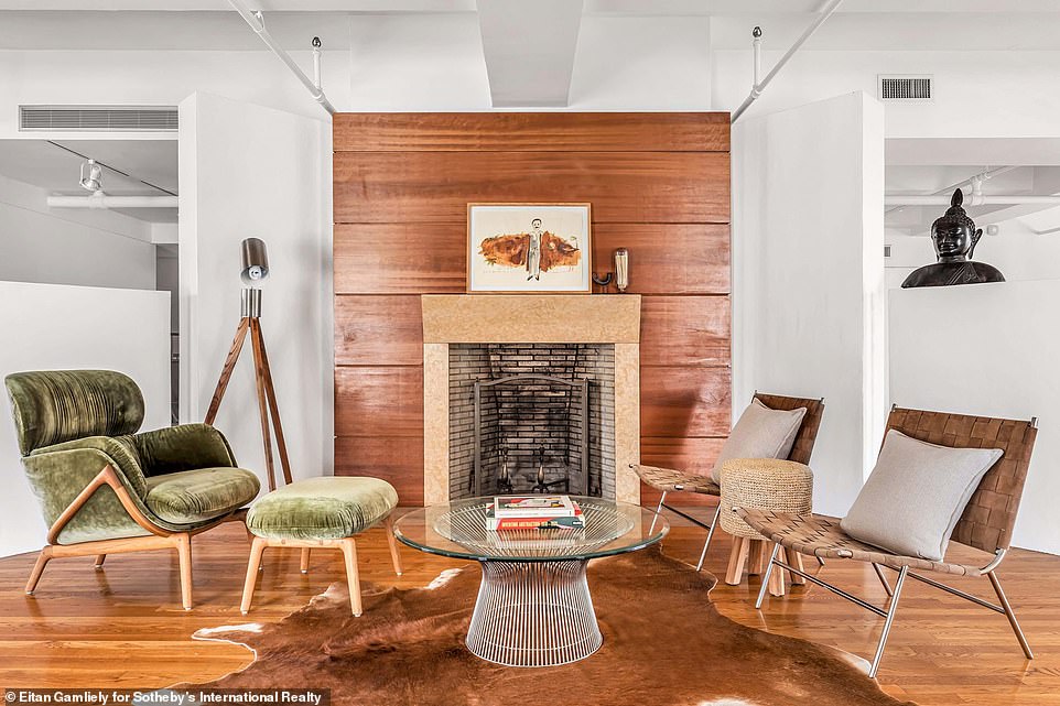 Time to rest: The loft features one wood-burning fireplace, with plenty of room for comfortable chairs