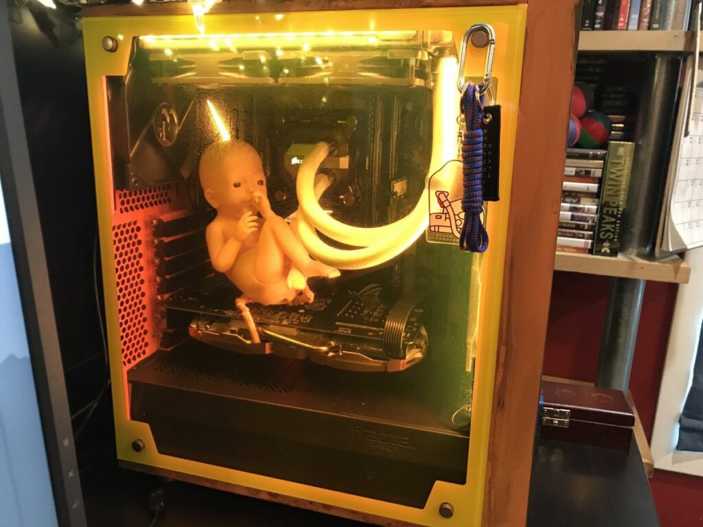 This Death Stranding PC build houses a toy baby, and it's both cute and nightmarish