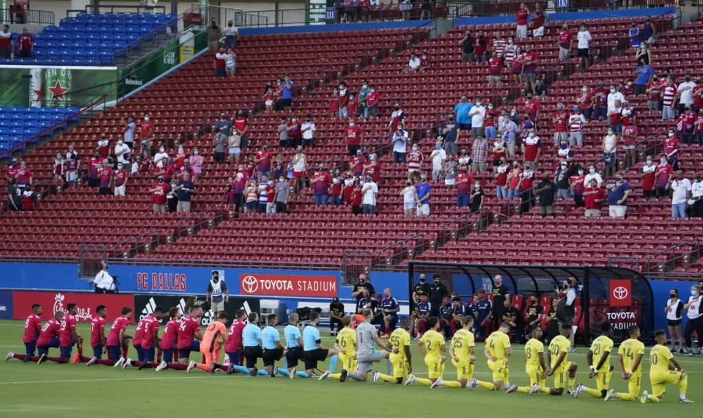 Players kneeling for anthem met with boos before MLS game