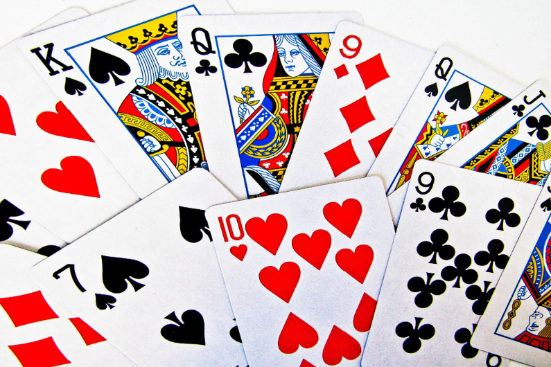 Where do the clubs, hearts, diamonds, and spades on playing cards come from?