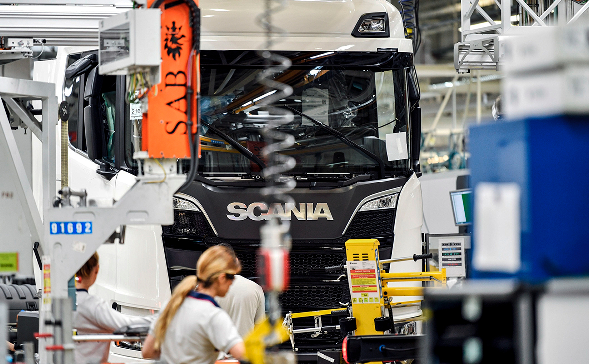 Employees on the production line at Scania's production plant
