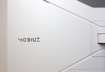Mobiuz lettering in reflective lettering on the back of the display case