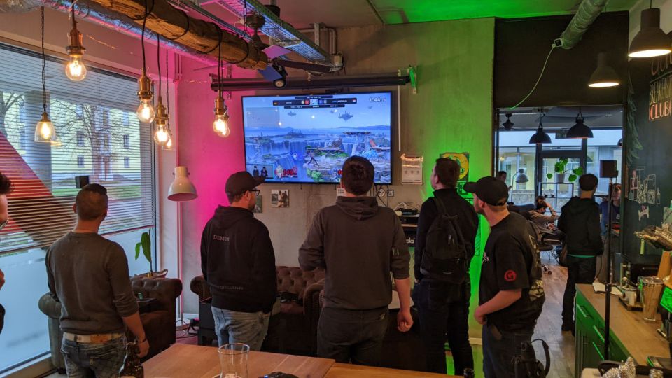 Players watch a Hill Top Zone match at the monthly meeting