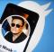 UKRAINE - 04/26/2022: In this photo illustration Elon Musk's Twitter account is seen displayed on a smartphone screen and the Twitter logo in the background.  (Photo illustration by Pavlo Gonchar/SOPA Images/LightRocket via Getty Images)